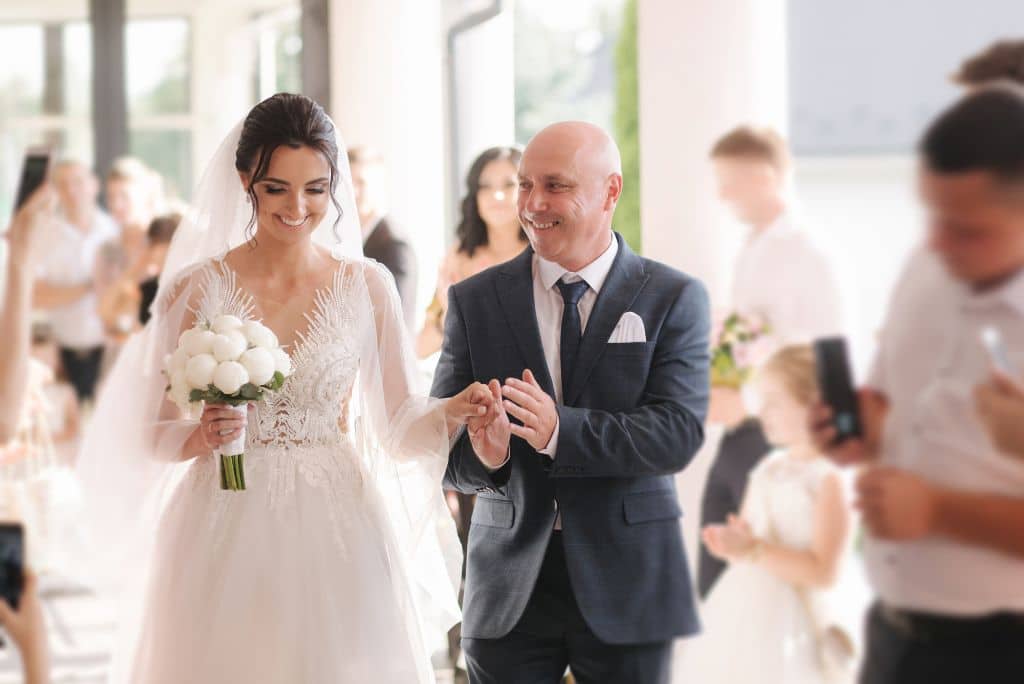 father and daughter at a wedding