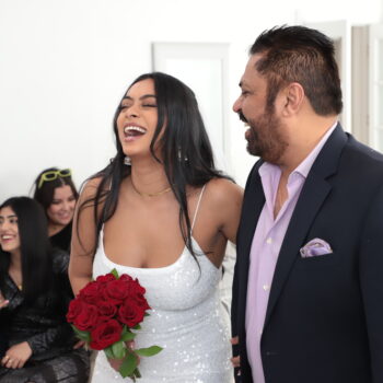 happy couple laughing during wedding ceremony