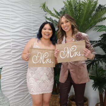 lgtbq Newlywed couple posing in hawaiian chapel Las Vegas wedding