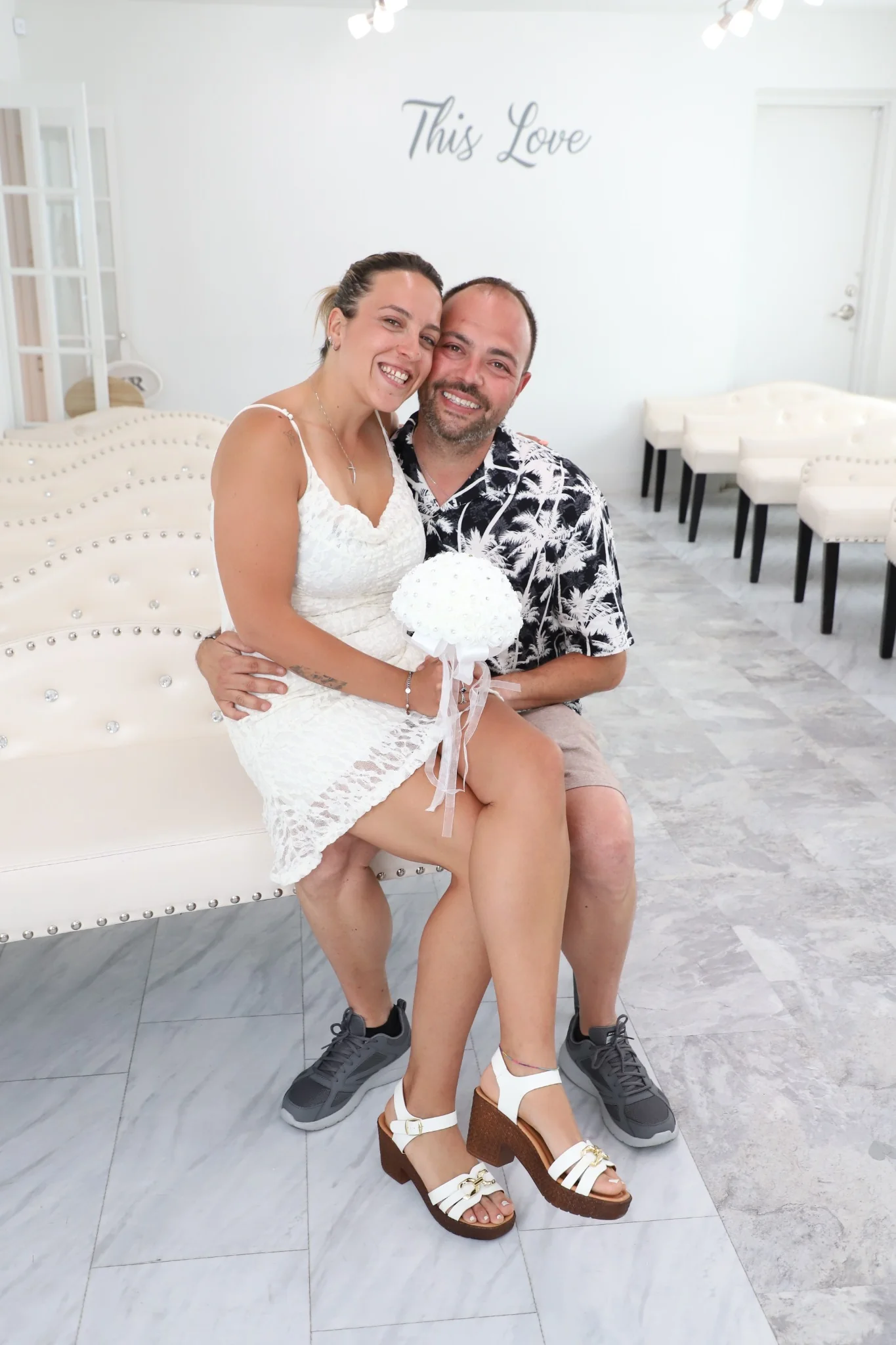 Couple smiling at camera Las Vegas wedding chapel