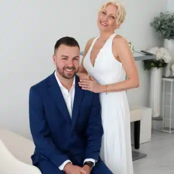 Happy newlywed couple posing together at a Las Vegas wedding chapel.